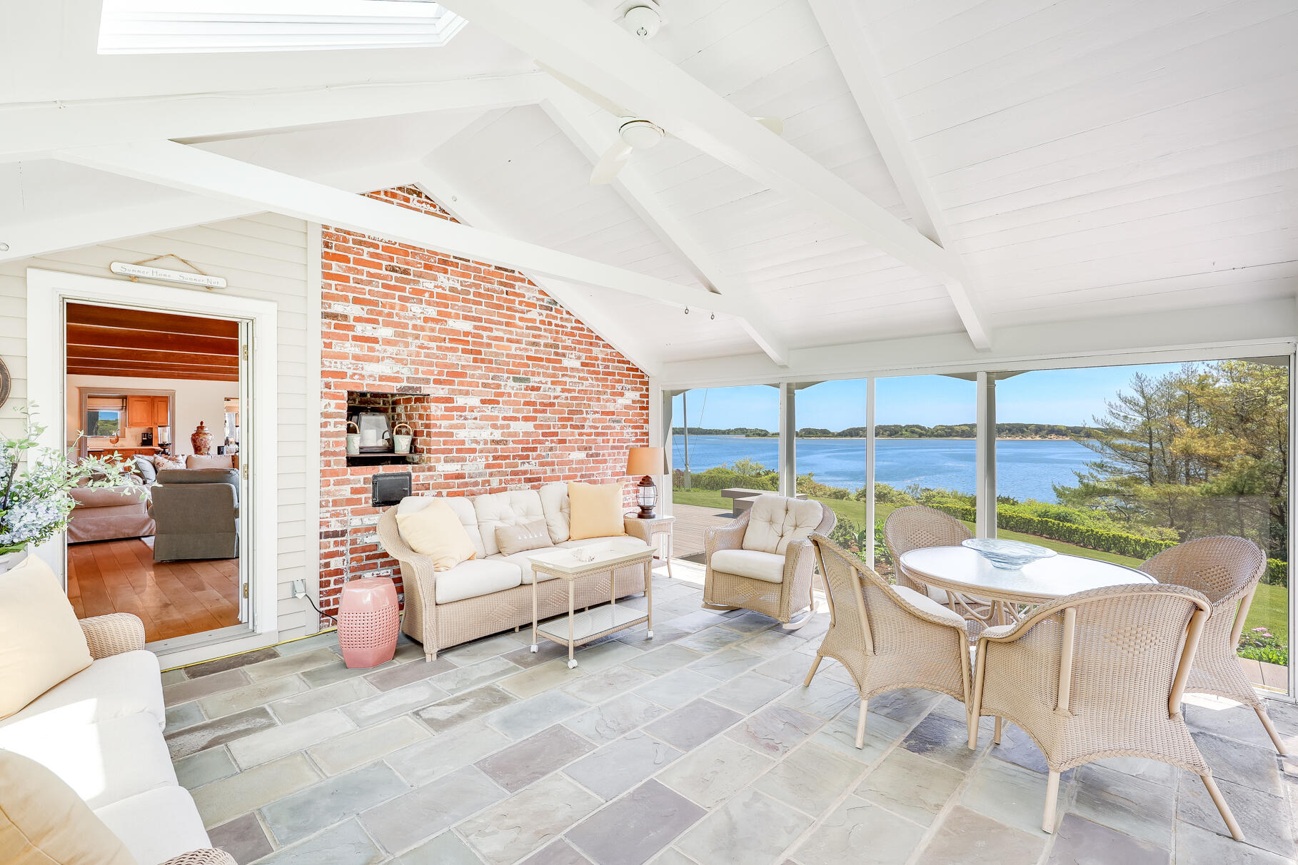 74-75 Viking Road Orleans, MA 02653 - Photo 28 of 69 a living room with furniture and a large window