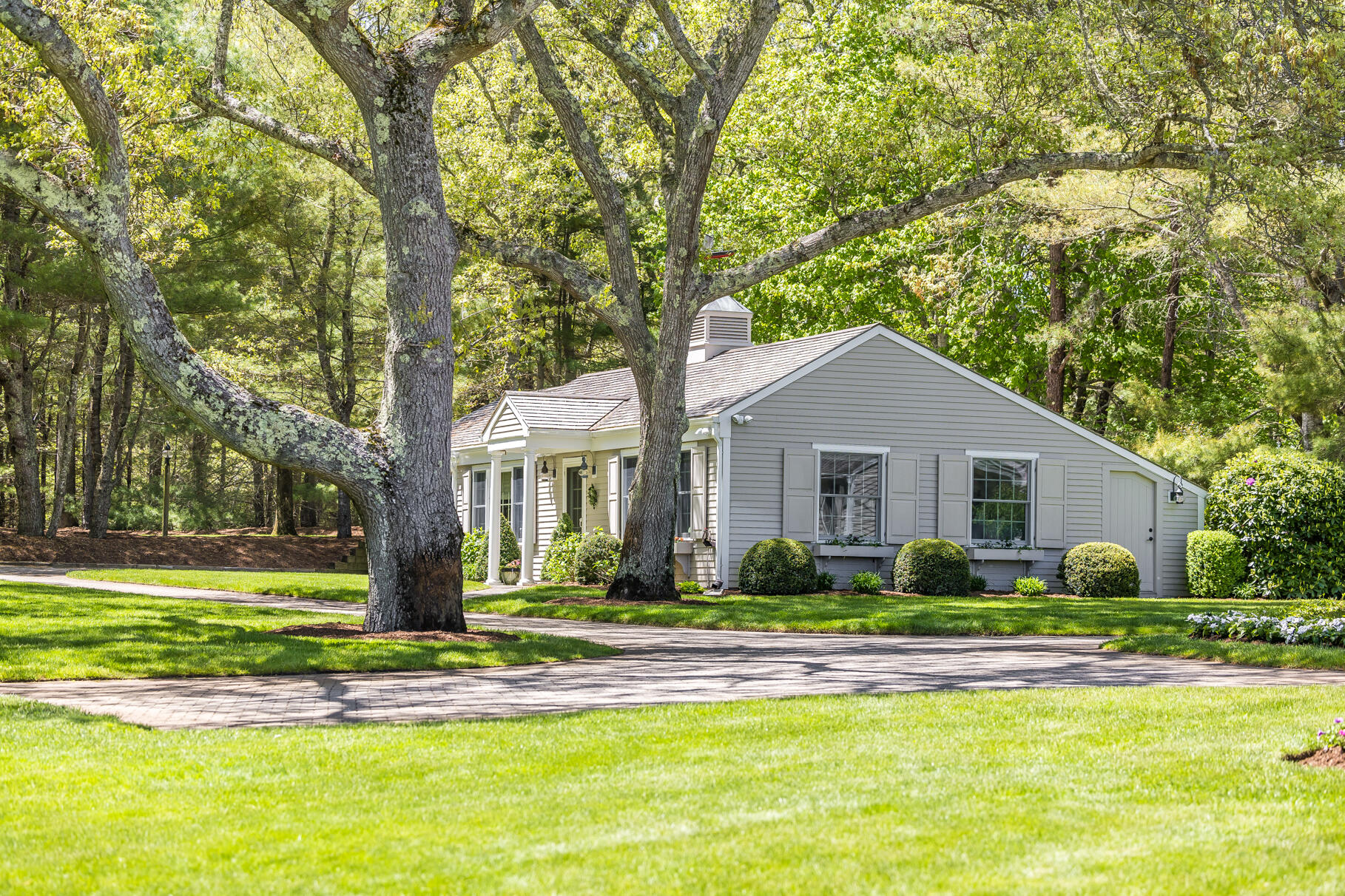 74-75 Viking Road Orleans, MA 02653 - Photo 31 of 69 a front view of house with yard and green space
