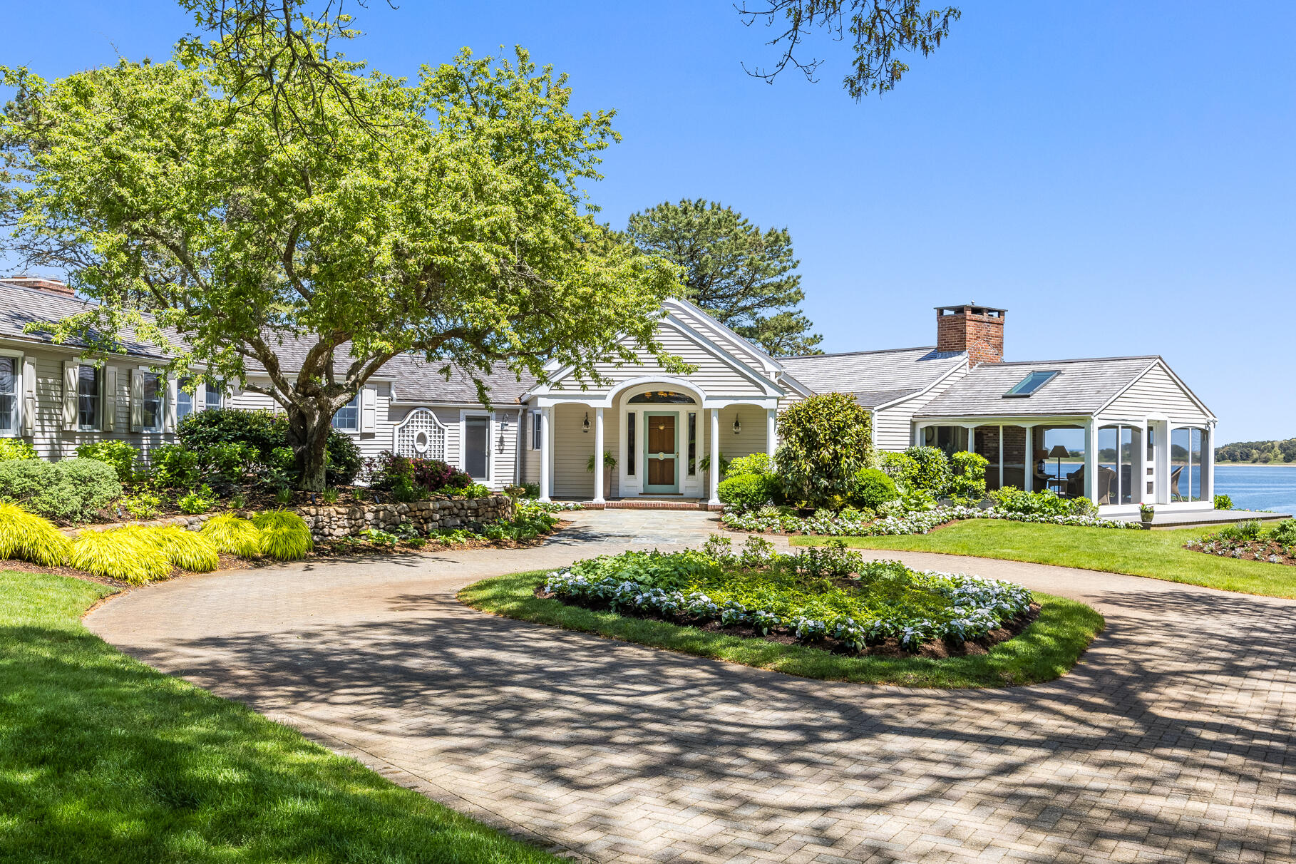 74-75 Viking Road Orleans, MA 02653 - Photo 4 of 69 a front view of a house with a yard