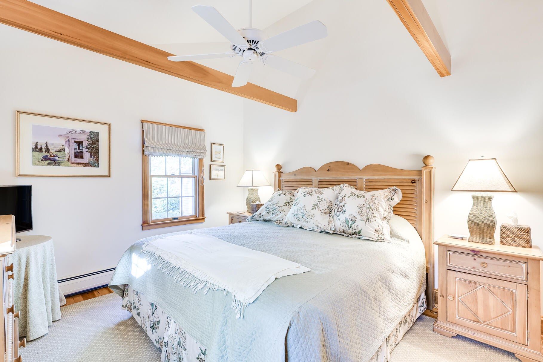 74-75 Viking Road Orleans, MA 02653 - Photo 42 of 69 a bedroom with a large bed and a window