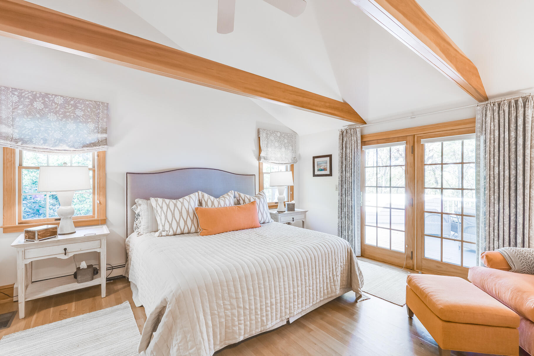 74-75 Viking Road Orleans, MA 02653 - Photo 49 of 69 a bedroom with a large bed and a large window with outer view