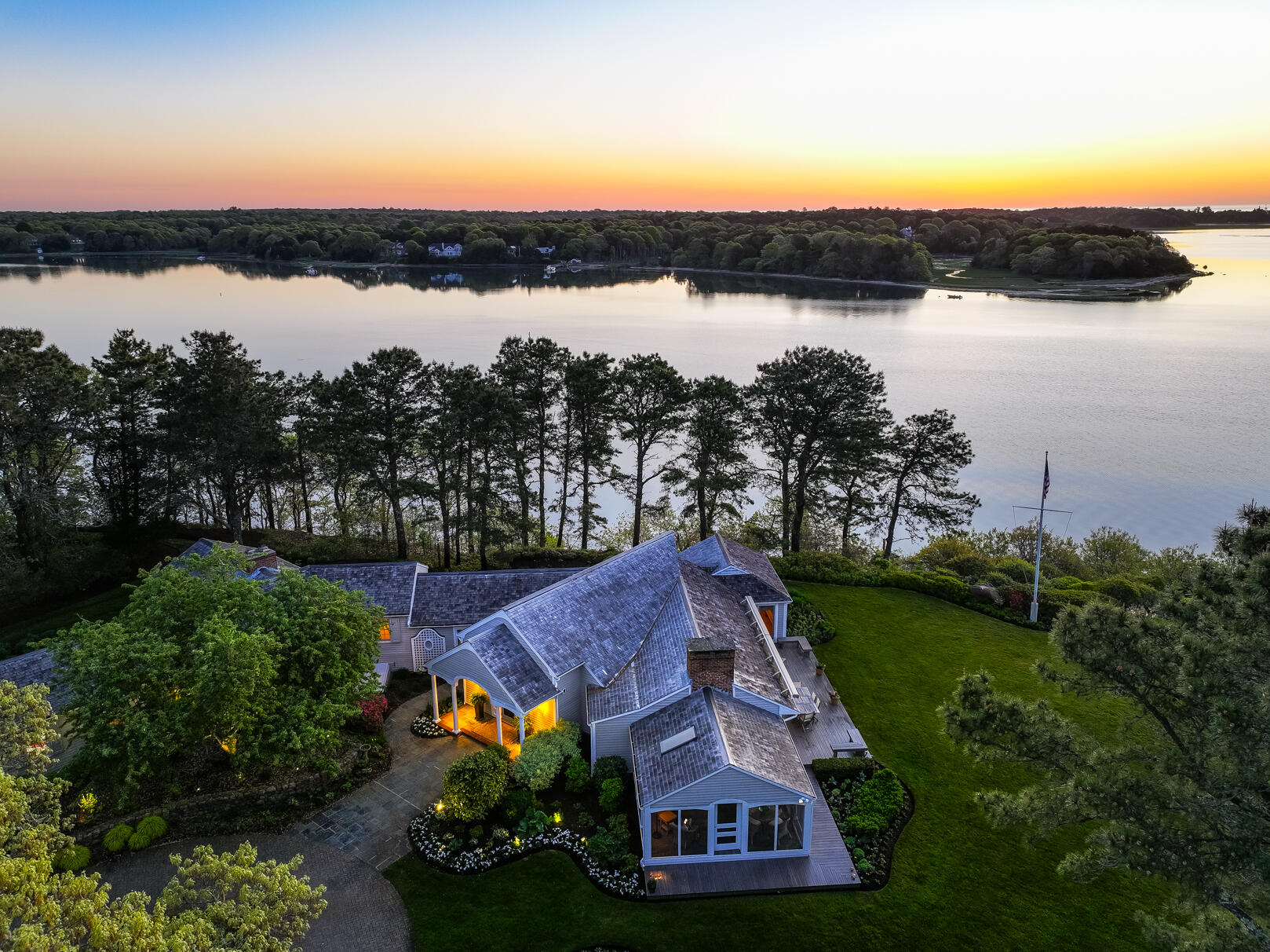 74-75 Viking Road Orleans, MA 02653 - Photo 58 of 69 an aerial view of a house with garden space and ocean view