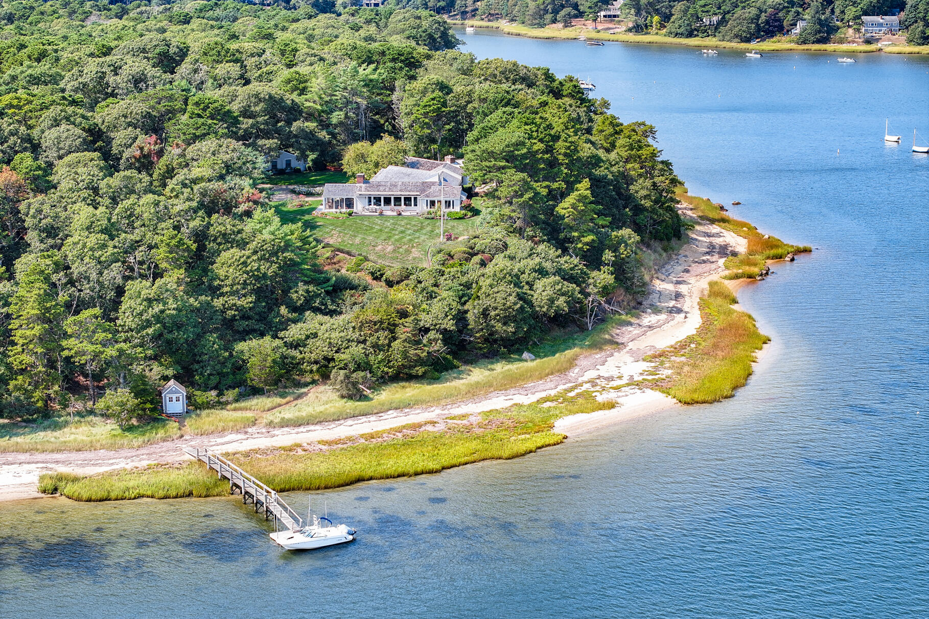74-75 Viking Road Orleans, MA 02653 - Photo 69 of 69 an aerial view of a house with a yard and lake view