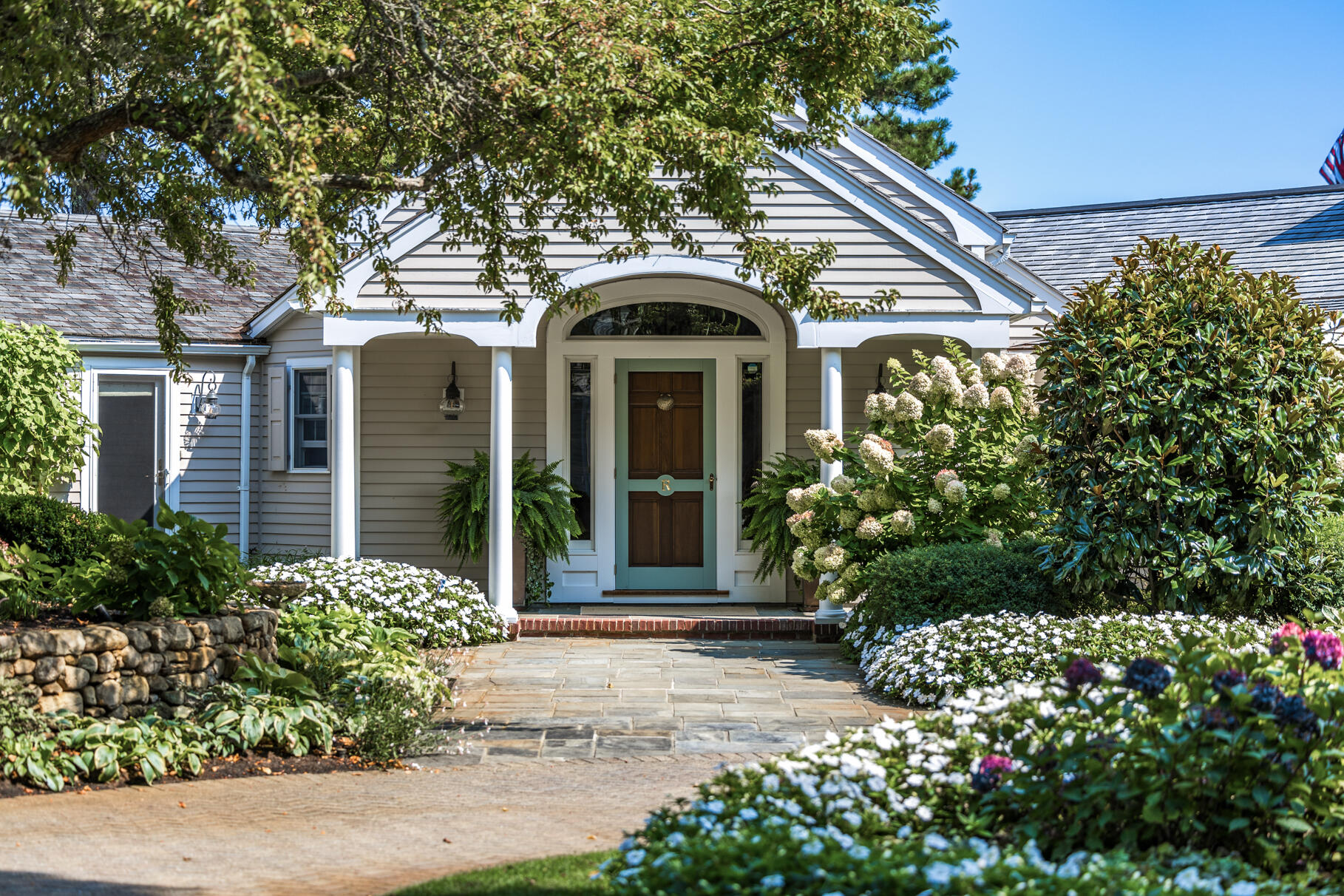74-75 Viking Road Orleans, MA 02653 - Photo 8 of 69 front view of a house with a small yard