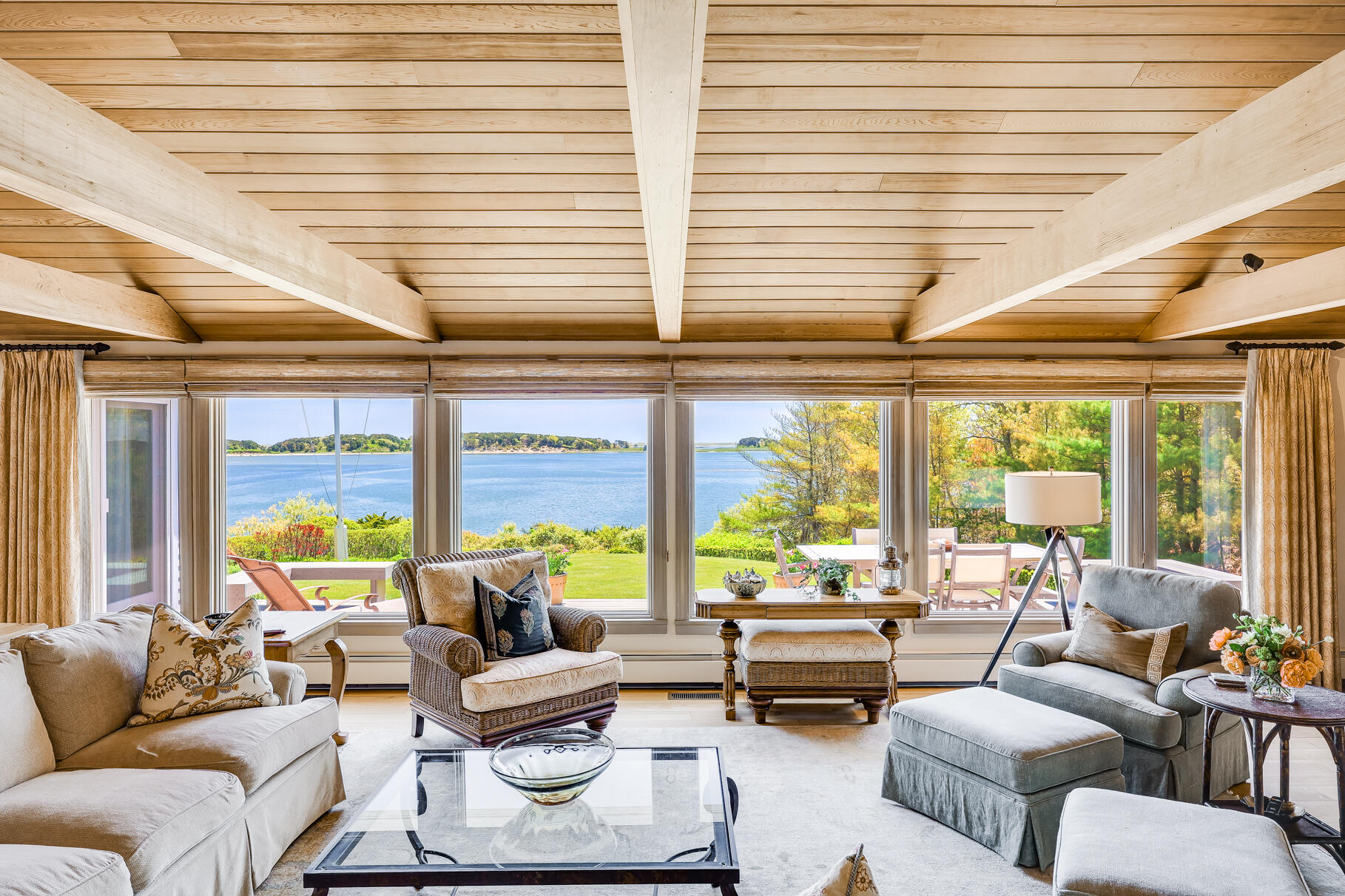 74-75 Viking Road Orleans, MA 02653 - Photo 10 of 69 a living room with furniture and floor to ceiling windows