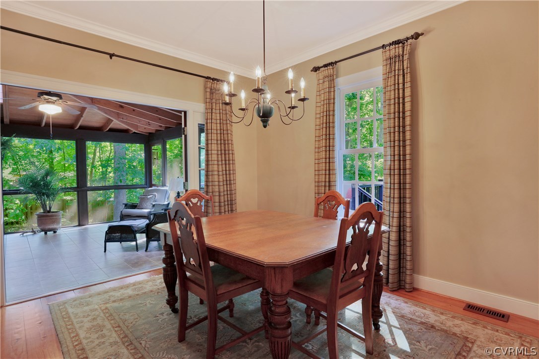 14600 Benefice Ridge Chesterfield, VA 23838 - Photo 21 of 37 Formal dining room with pine wood floor, crown mol