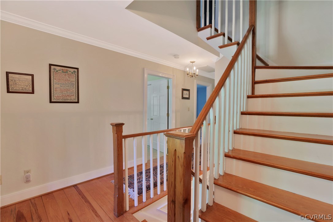 14600 Benefice Ridge Chesterfield, VA 23838 - Photo 24 of 37 Gorgeous wood staircase with detailed mill work an