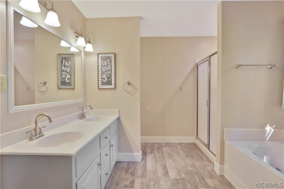 14600 Benefice Ridge Chesterfield, VA 23838 - Photo 27 of 37 Master bathroom with new tile flooring, jetted tub