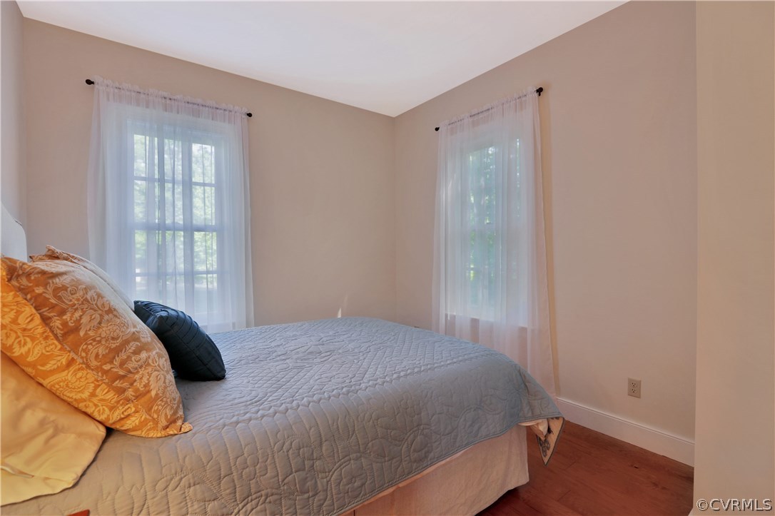 14600 Benefice Ridge Chesterfield, VA 23838 - Photo 10 of 37 First floor bedroom with pine wood floor and a clo