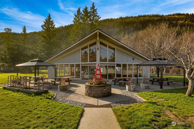 a view of a yard with swimming pool