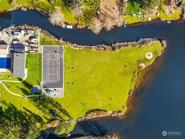 a view of a swimming pool with a lounge chairs