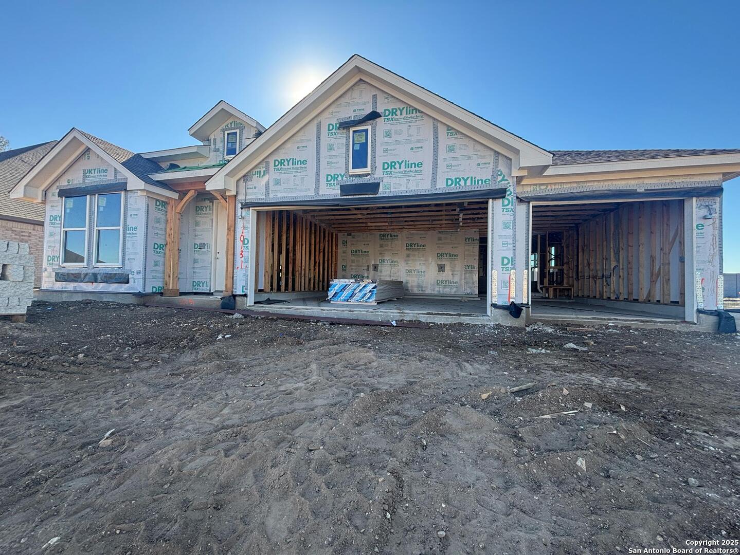 10131 Dew Rdg Way Schertz, TX 78154 - Photo 9 of 41 a front view of a house with a yard and garage