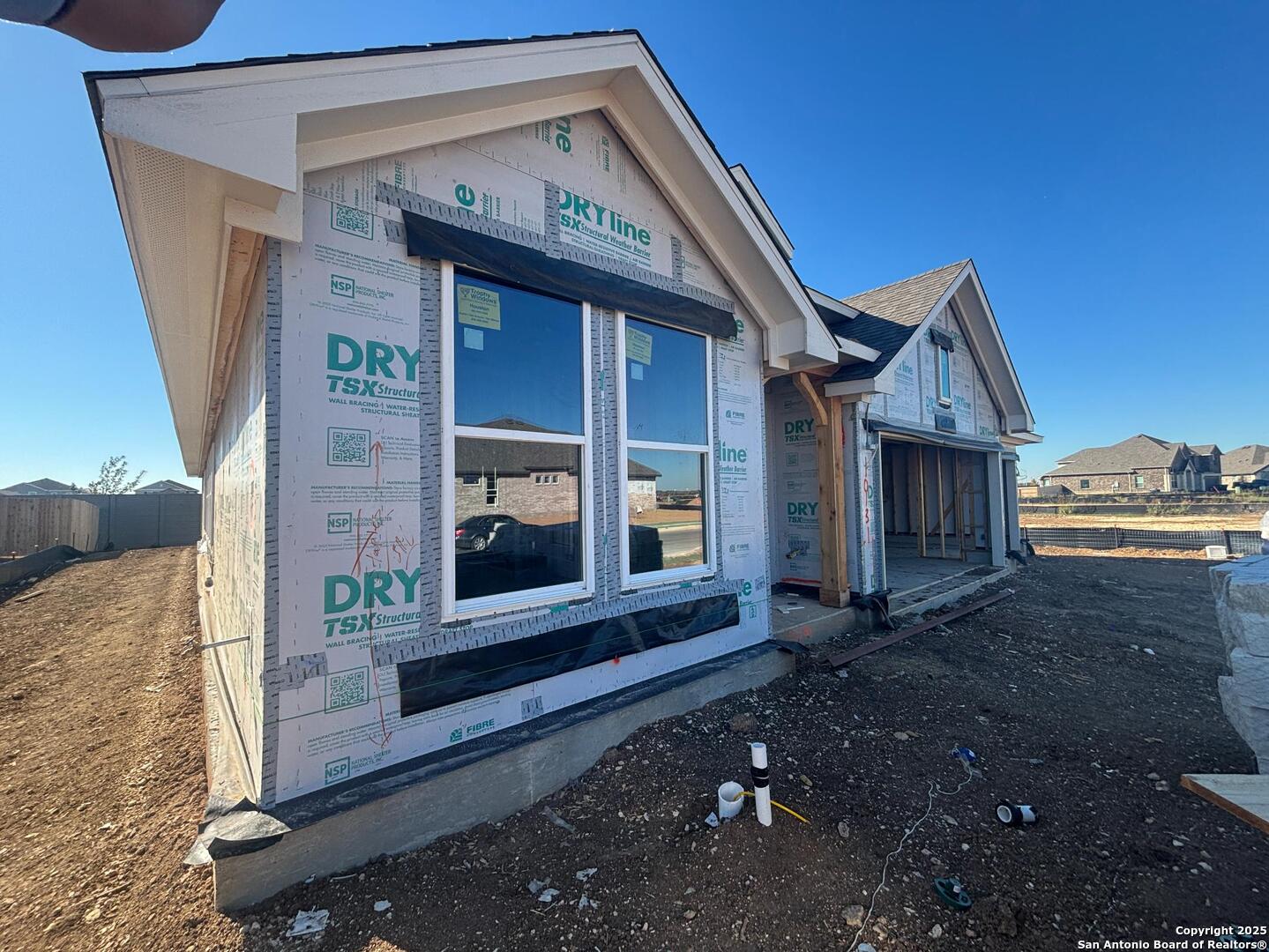 10131 Dew Rdg Way Schertz, TX 78154 - Photo 10 of 41 a front view of a house with a yard