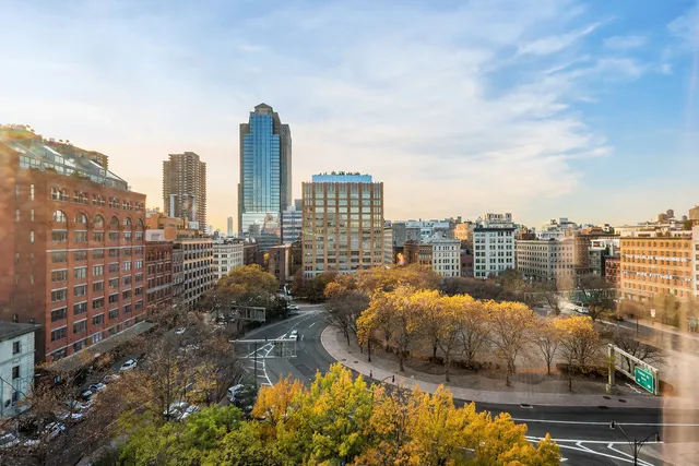 a view of a city with tall buildings