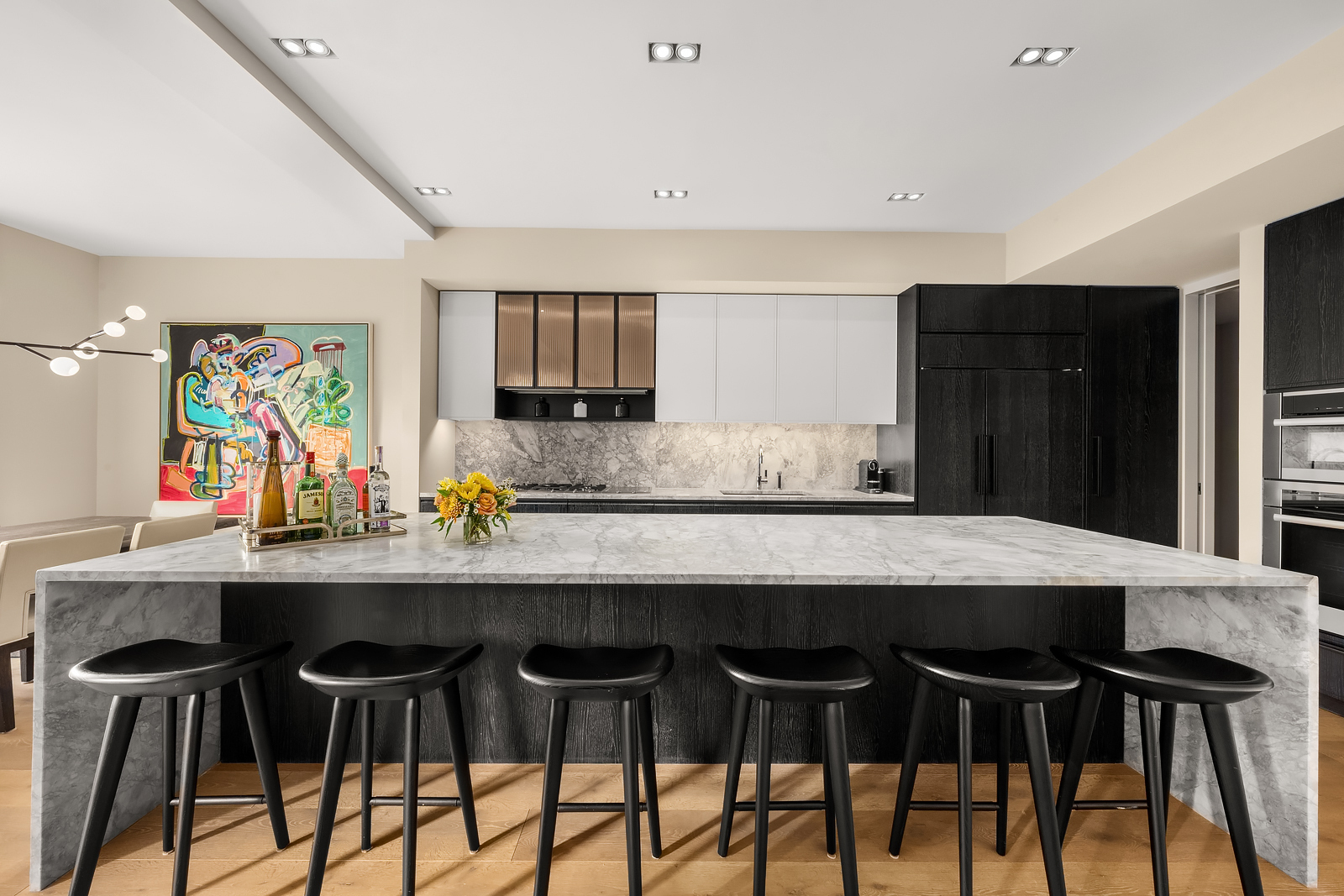 11 Beach Street, Unit 8A Manhattan, NY 10013 - Photo 4 of 23 a kitchen with a table and chairs in it