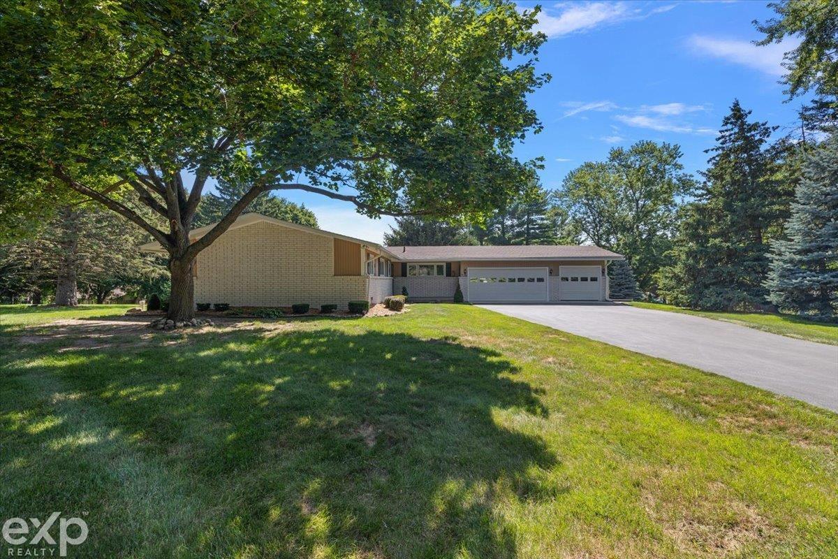 6577 High Rim Court Washington, MI 48094 - Photo 2 of 82 50182994-13216547-491c-43ab-9921-bf9289aef5e9.JPG