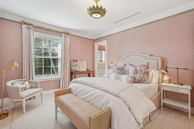 a bathroom with a sink toilet vanity and shower