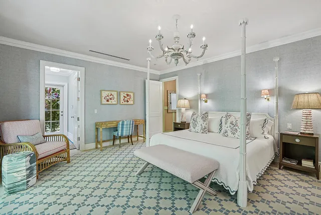 a spacious bathroom with a sink a toilet a mirror and shower