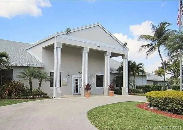 front view of a house with a patio