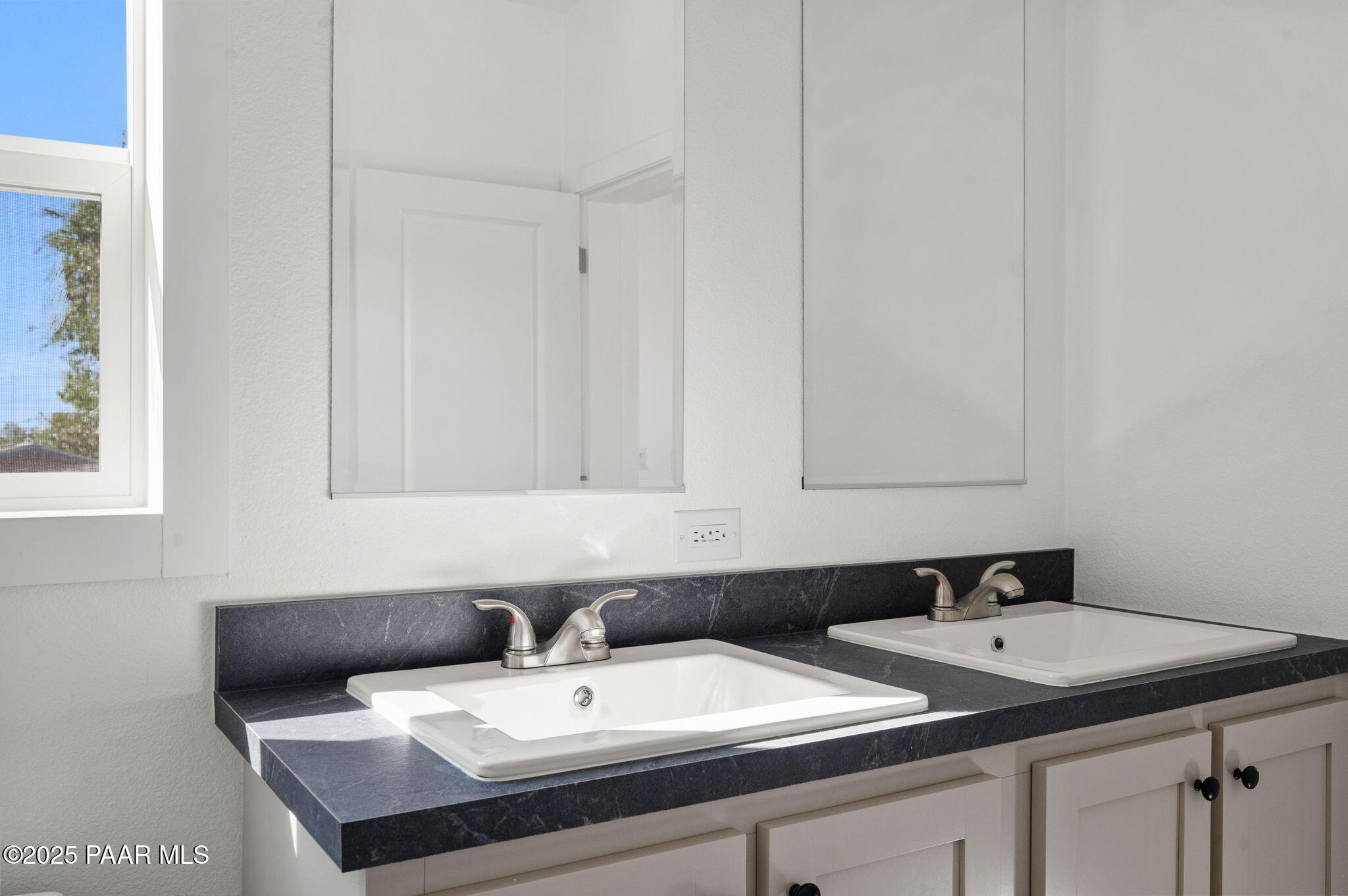 39 East Abra Road Paulden, AZ 86334 - Photo 16 of 23 a bathroom with a sink and a mirror