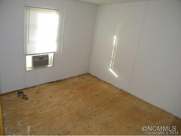 188 Worth Lane Rutherfordton, NC 28139 - Photo 10 of 14 an empty room with a window