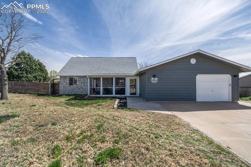 10905 Falling Star Road Fountain, CO 80817 - Photo 1 of 46 Front of the house. Featuring screened-in porch.