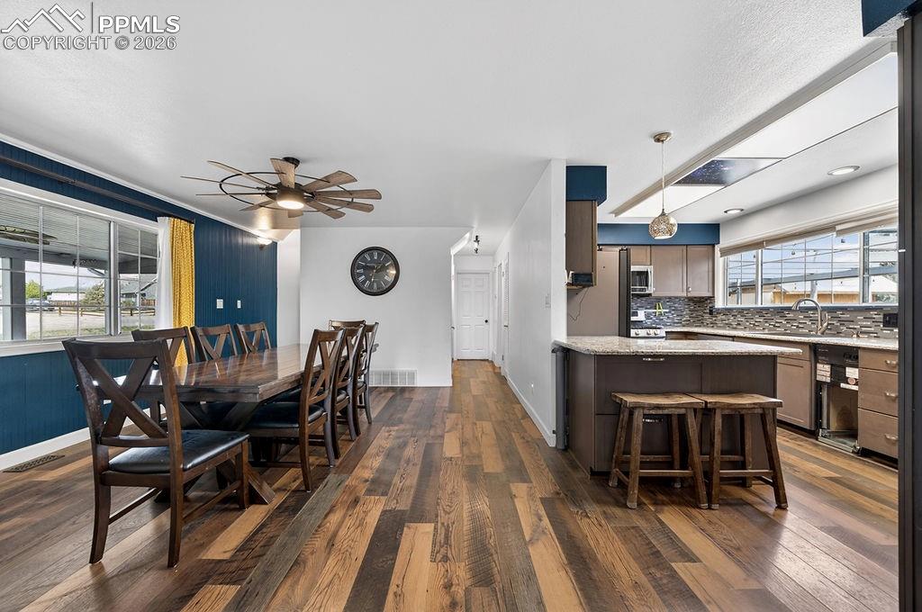 10905 Falling Star Road Fountain, CO 80817 - Photo 13 of 46 View of dining and kitchen from living room.