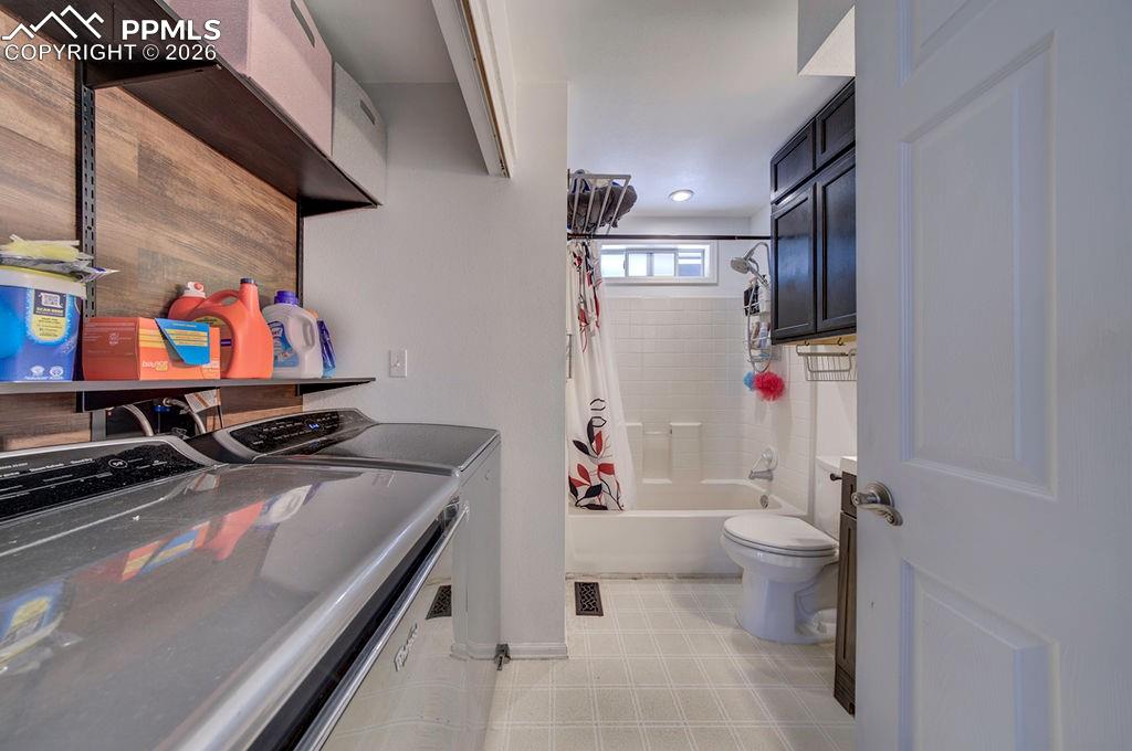 10905 Falling Star Road Fountain, CO 80817 - Photo 19 of 46 Laundry area located in the main level bathroom.