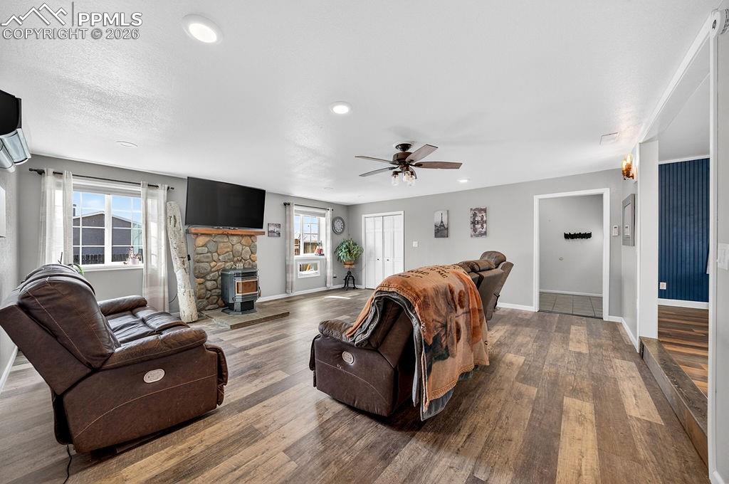 10905 Falling Star Road Fountain, CO 80817 - Photo 6 of 46 Spacious living room with pellet stove.