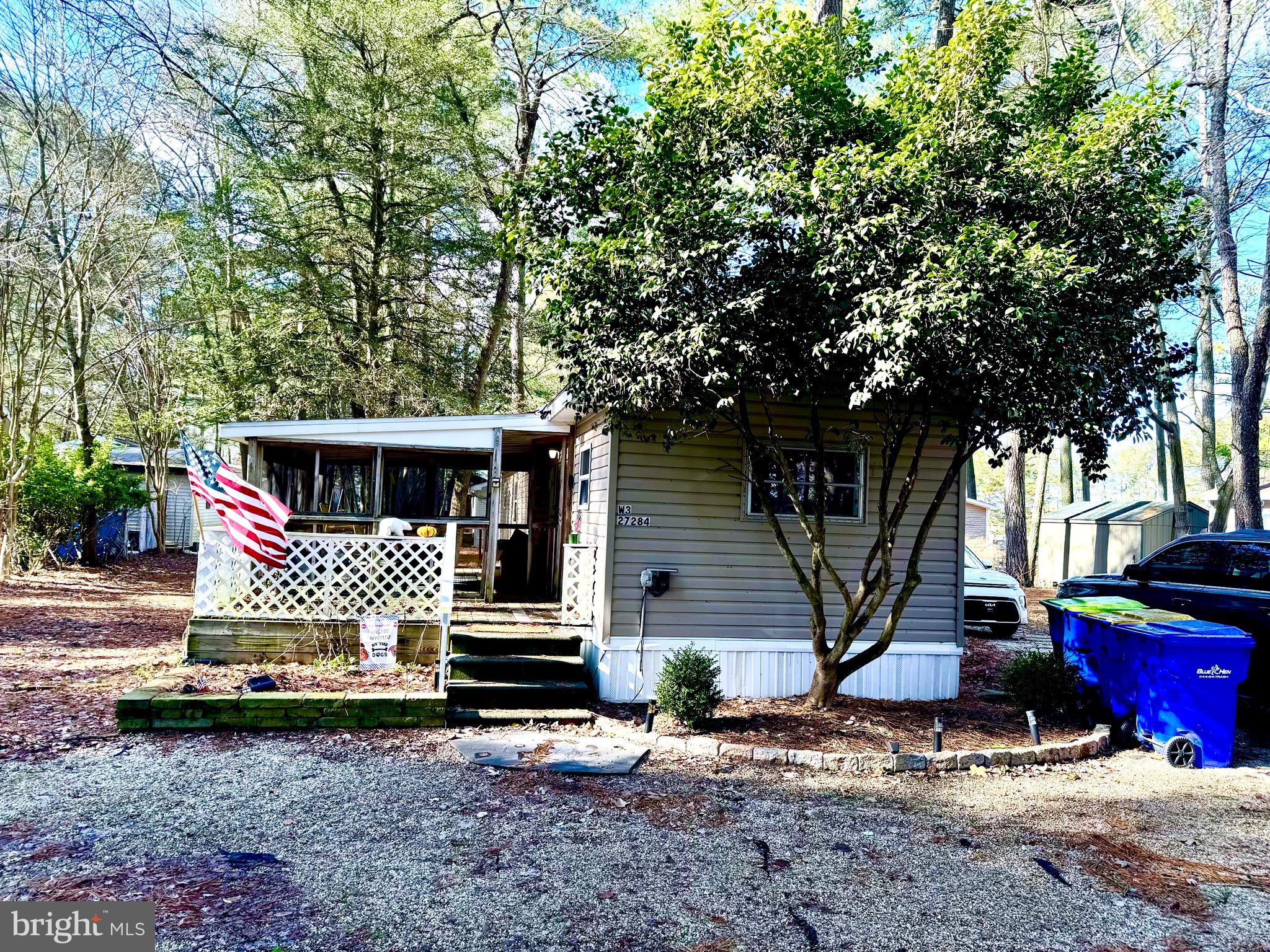 27284 Cottage Road Millsboro, DE 19966 - Photo 1 of 8 a view of a house with backyard