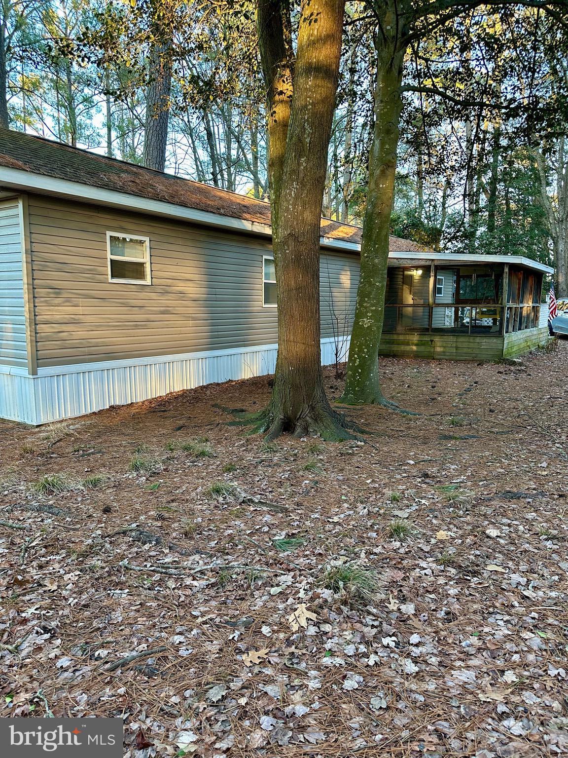 27284 Cottage Road Millsboro, DE 19966 - Photo 2 of 8 a view of a house with a yard