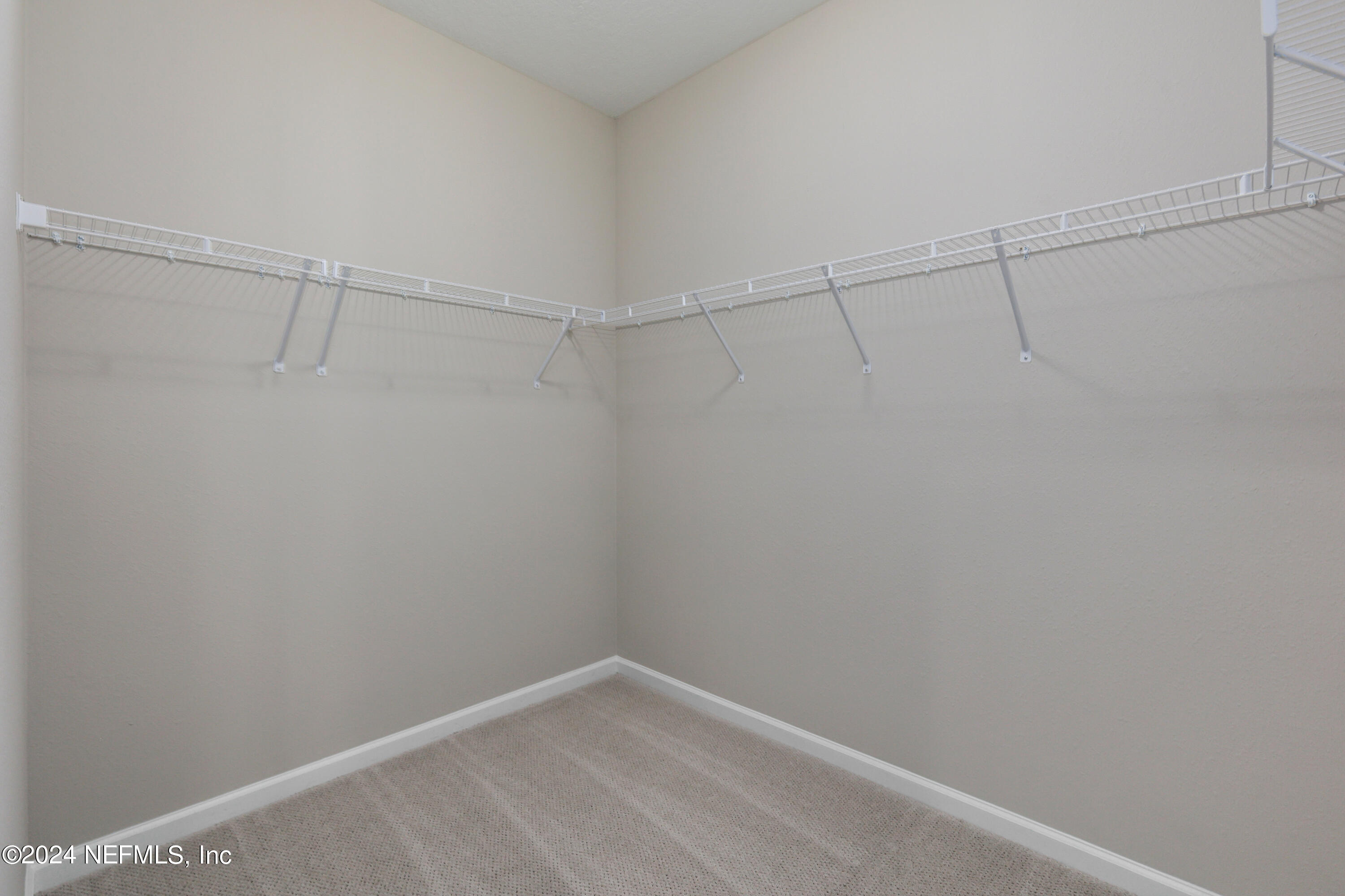 75605 Blackbird Drive Yulee, FL 32097 - Photo 22 of 46 a view of a room with racks on the wall