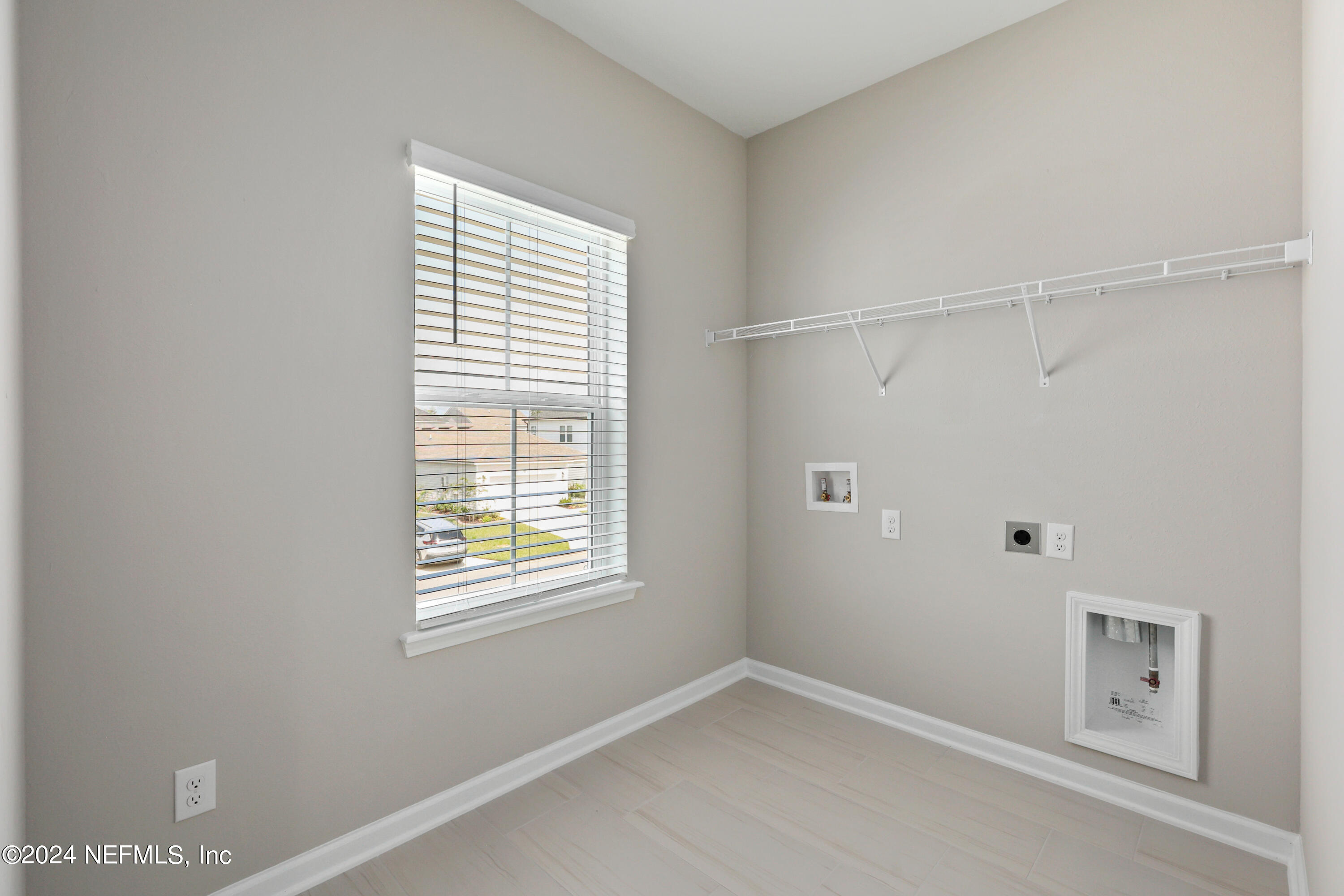 75605 Blackbird Drive Yulee, FL 32097 - Photo 26 of 46 a view of an empty room with a window