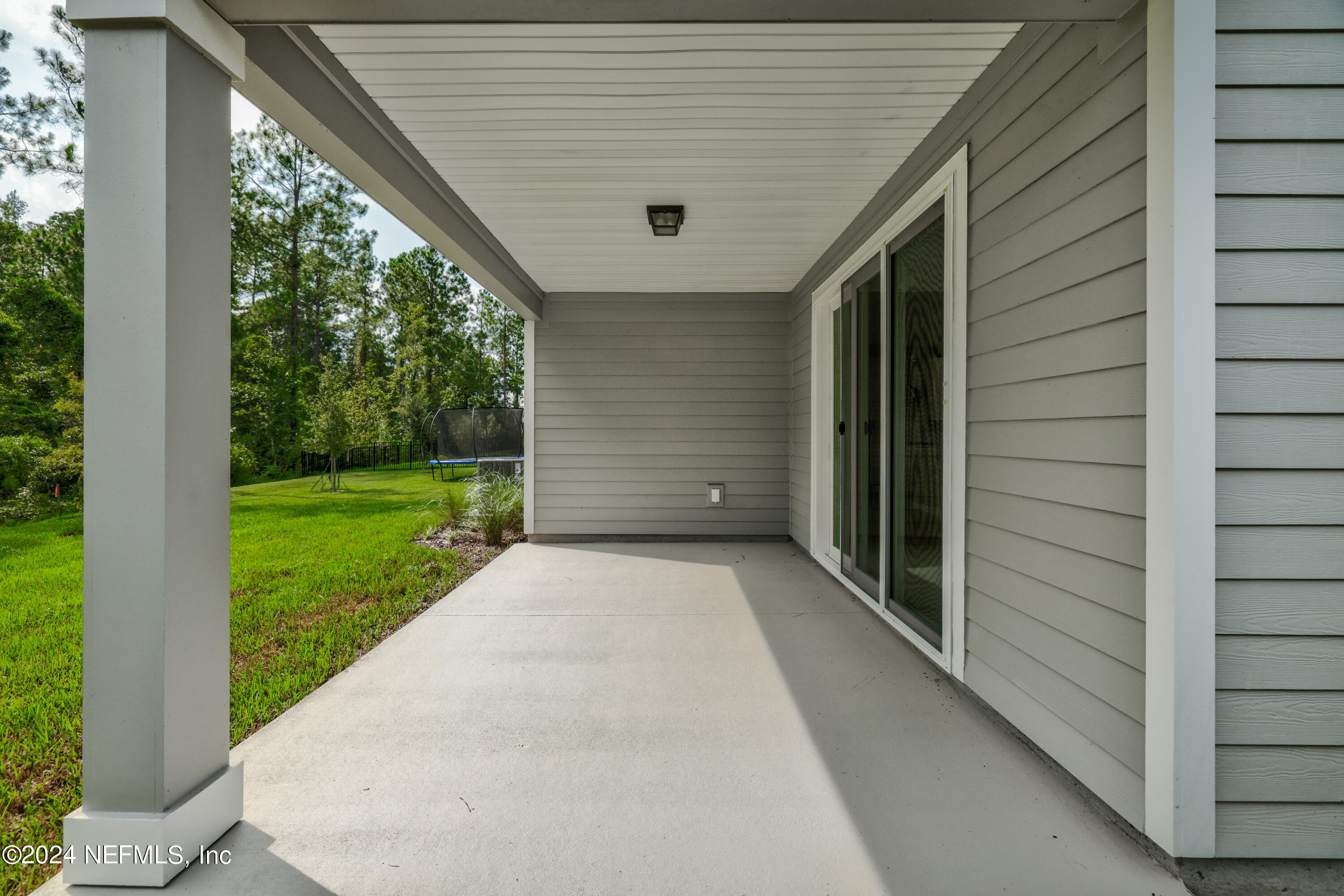 75605 Blackbird Drive Yulee, FL 32097 - Photo 27 of 46 a view of a back yard of the house