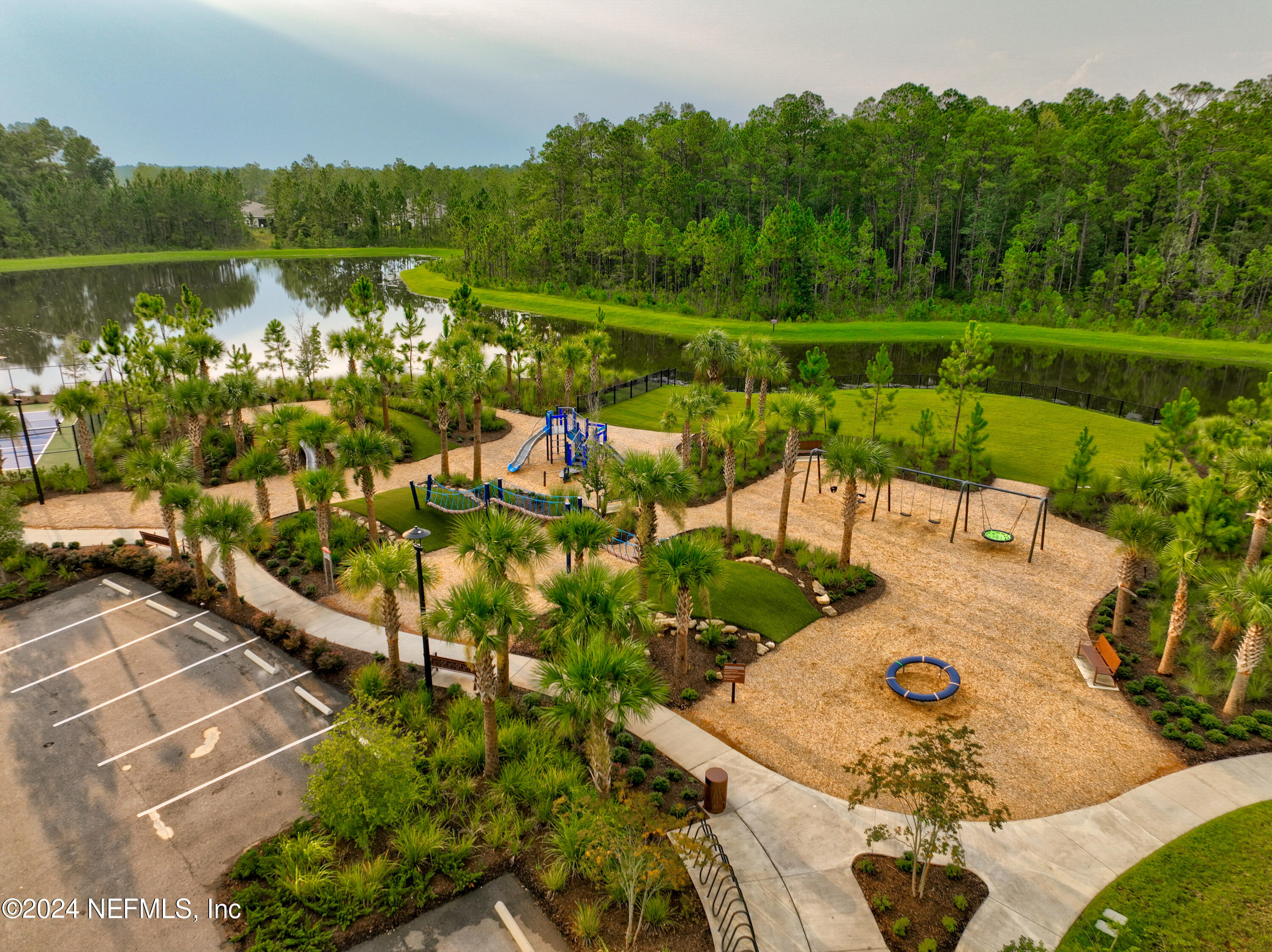 75605 Blackbird Drive Yulee, FL 32097 - Photo 41 of 46 a view of a lake with a yard