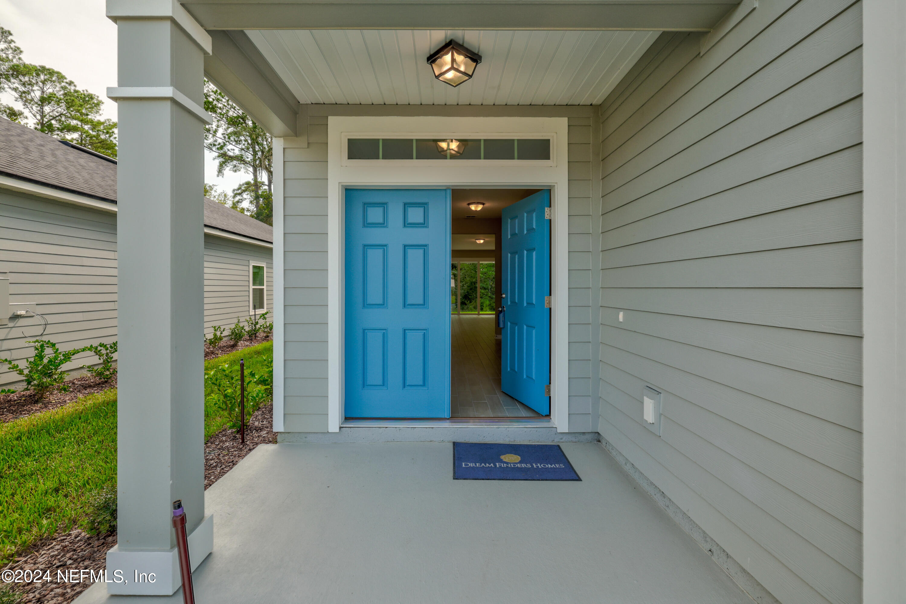 75605 Blackbird Drive Yulee, FL 32097 - Photo 6 of 46 a view of entrance gate of the house