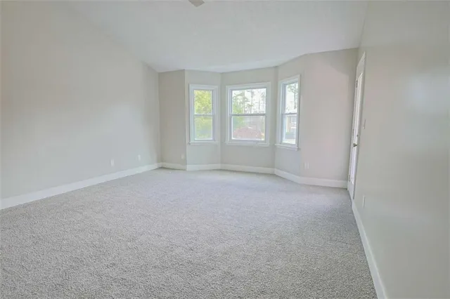 a bathroom with a sink a mirror and a shower