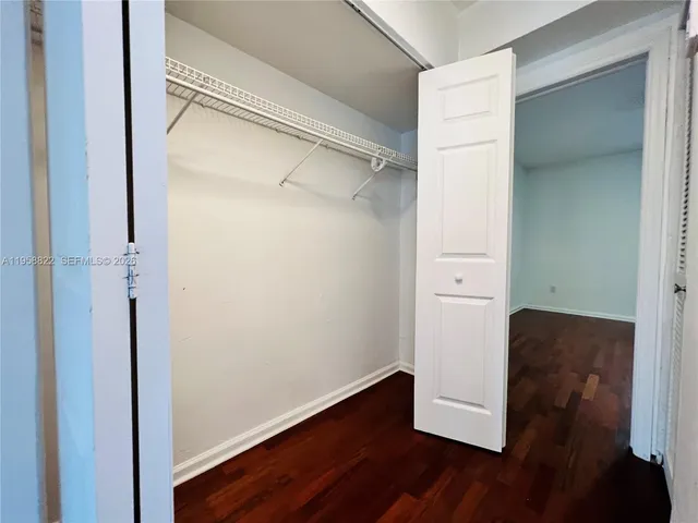 a view of an empty walk in closet