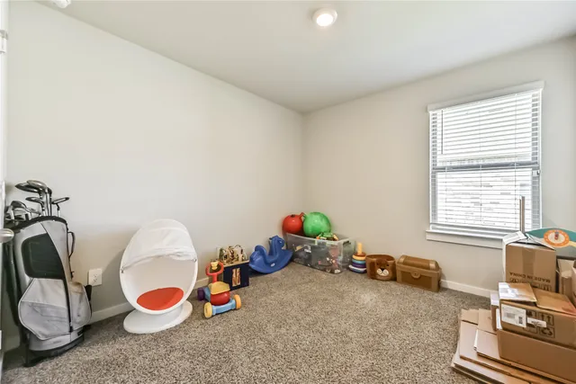 a room with toys and gym equipment