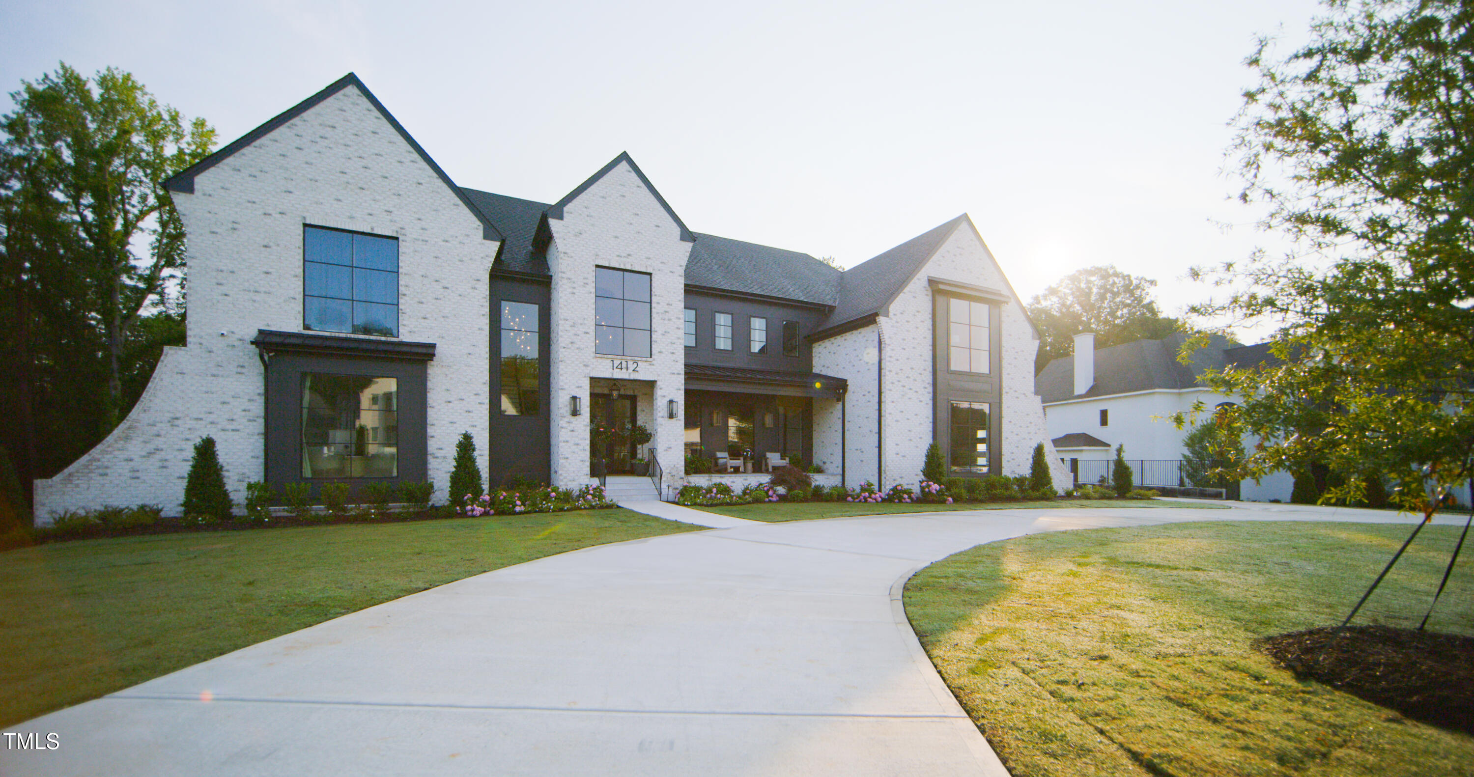 1620 Hunting Ridge Road Raleigh, NC 27615 - Photo 1 of 24 a front view of a house with a yard