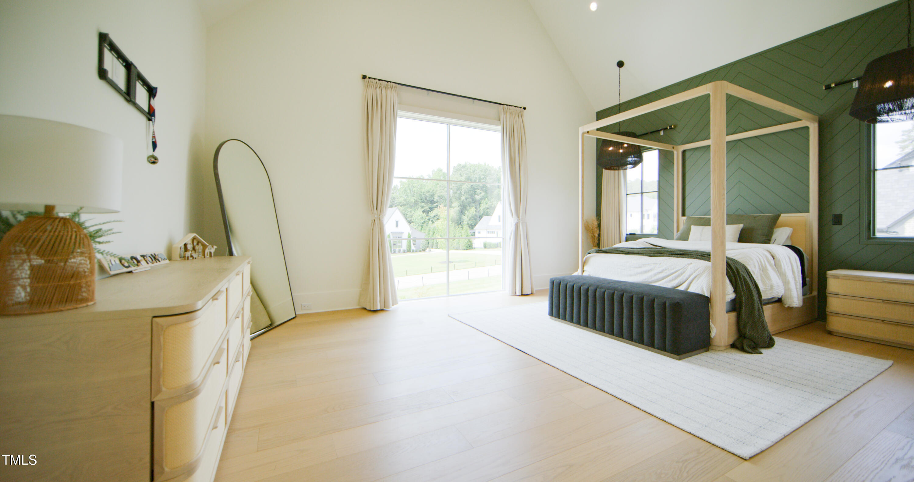 1620 Hunting Ridge Road Raleigh, NC 27615 - Photo 16 of 24 a bedroom with a bed and a large window