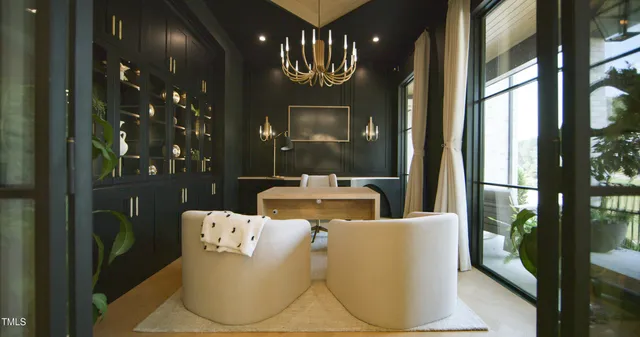 a bedroom with a bed and large window with outer view