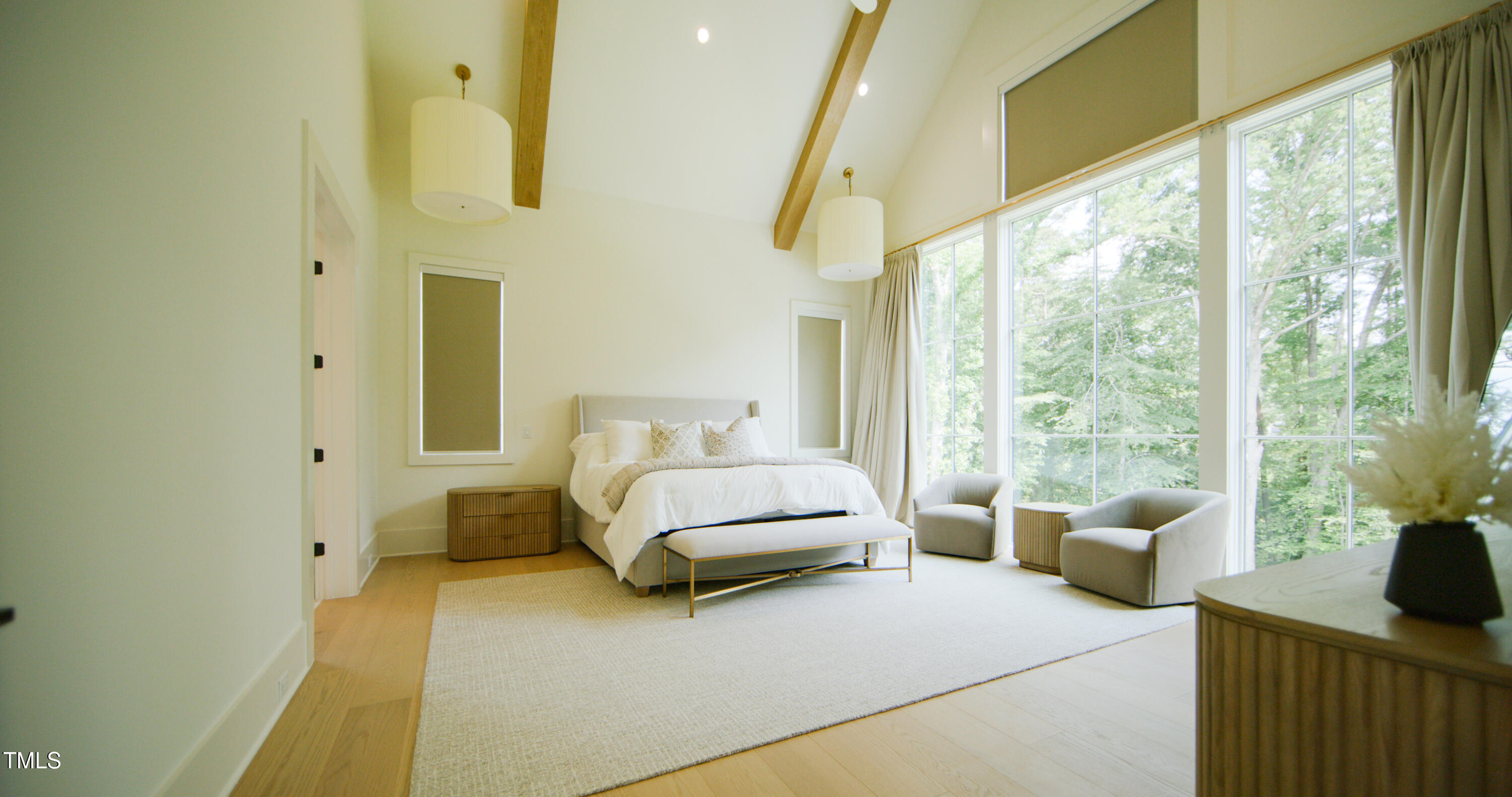 1620 Hunting Ridge Road Raleigh, NC 27615 - Photo 6 of 24 a bedroom with a bed and large window with outer view