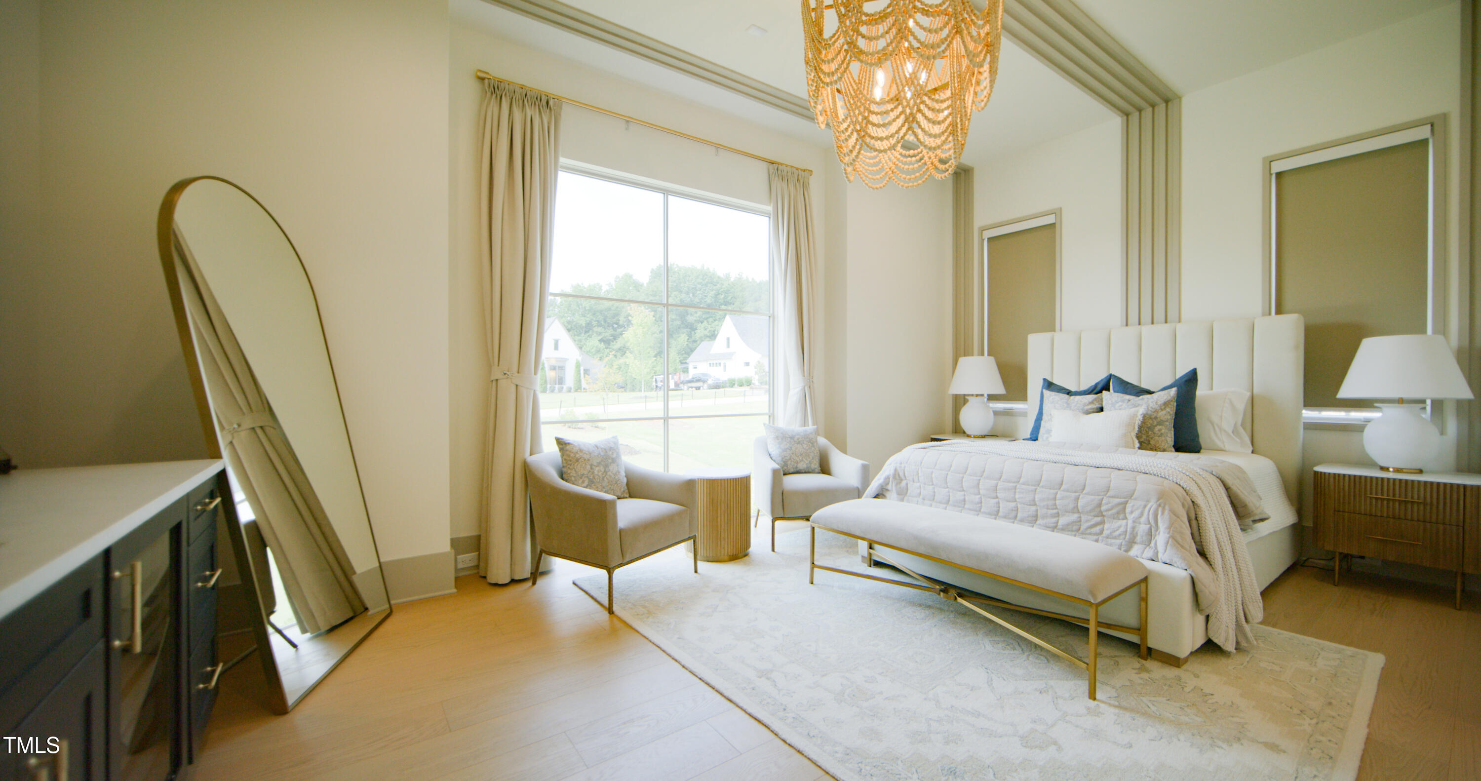 1620 Hunting Ridge Road Raleigh, NC 27615 - Photo 10 of 24 a spacious bedroom with a bed and a large window