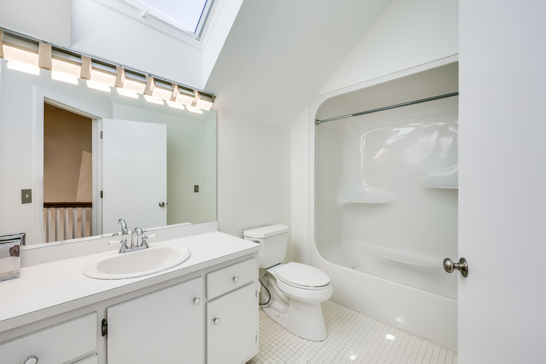 68 Mid-Iron Way, Unit 7545 Mashpee, MA 02649 - Photo 23 of 43 a bathroom with a sink a toilet and shower