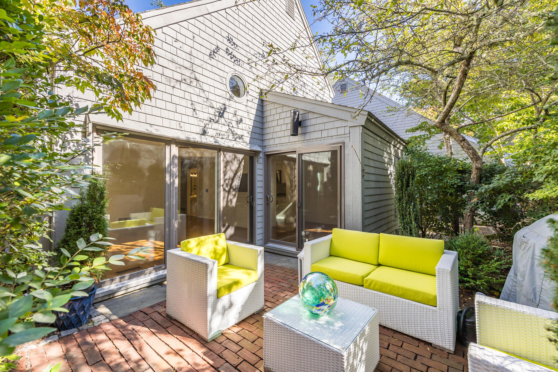 68 Mid-Iron Way, Unit 7545 Mashpee, MA 02649 - Photo 25 of 43 a view of outdoor seating space with furniture and garden view