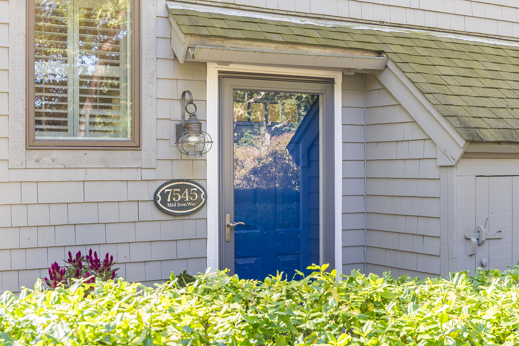 68 Mid-Iron Way, Unit 7545 Mashpee, MA 02649 - Photo 27 of 43 a front view of a house