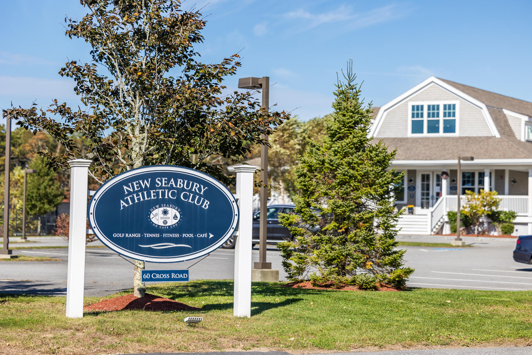 68 Mid-Iron Way, Unit 7545 Mashpee, MA 02649 - Photo 34 of 43 a front view of a house with garden