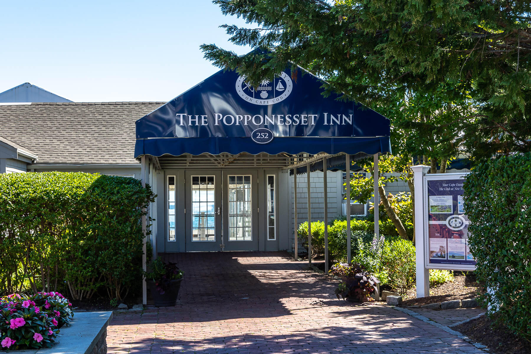 68 Mid-Iron Way, Unit 7545 Mashpee, MA 02649 - Photo 40 of 43 a view of a house with potted plants