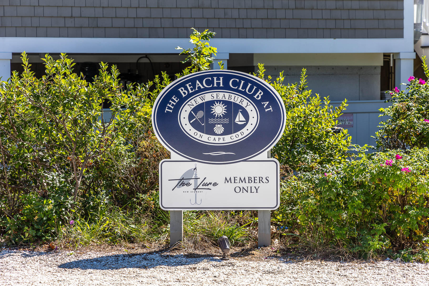 68 Mid-Iron Way, Unit 7545 Mashpee, MA 02649 - Photo 41 of 43 a view of outdoor space with sign board